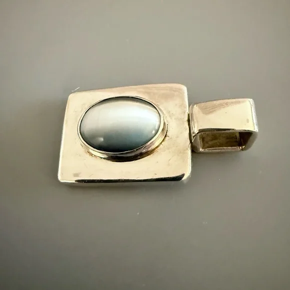 Mexico Blue Cats Eye Sterling Silver Pendant
18 Grams - Picture 2 of 5